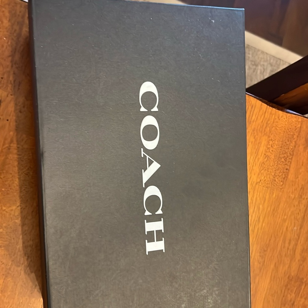 Coach Shelby Straw sandal size 7. Never worn.